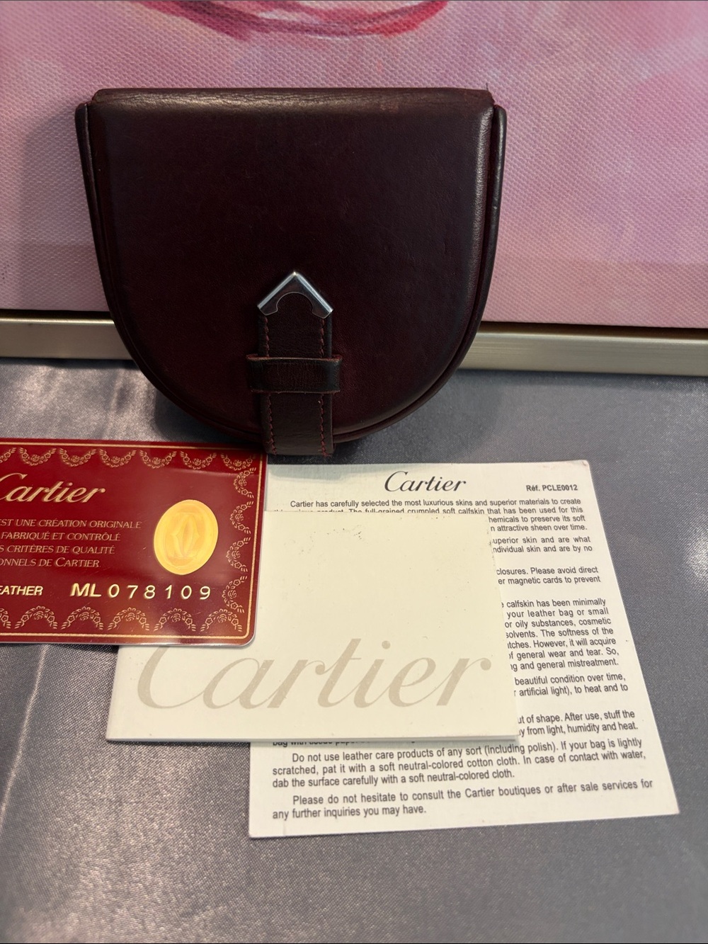 Cartier Deep Burgundy Leather Half-Moon Pouch with Silver Accent